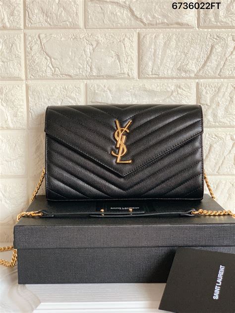 ysl clutch black and gold